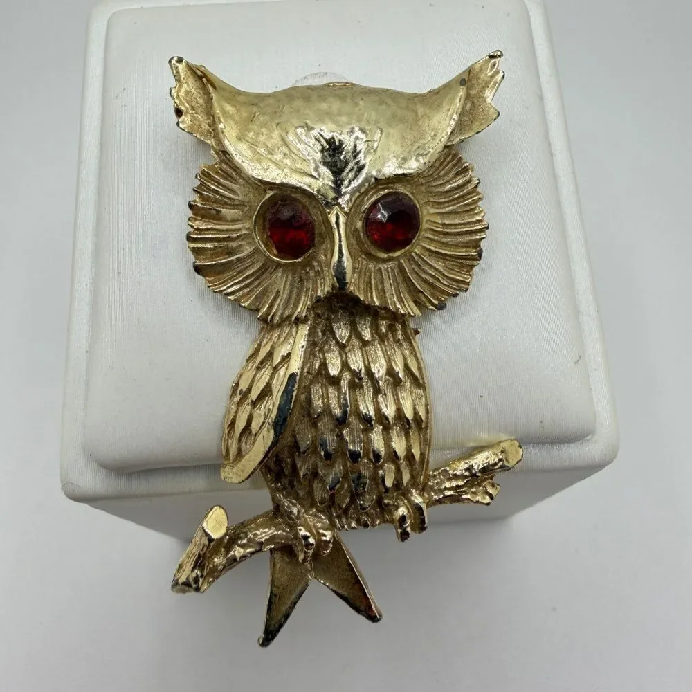 Vintage Gerry's gold tone owl brooch/pin with red rhinestone eyes!